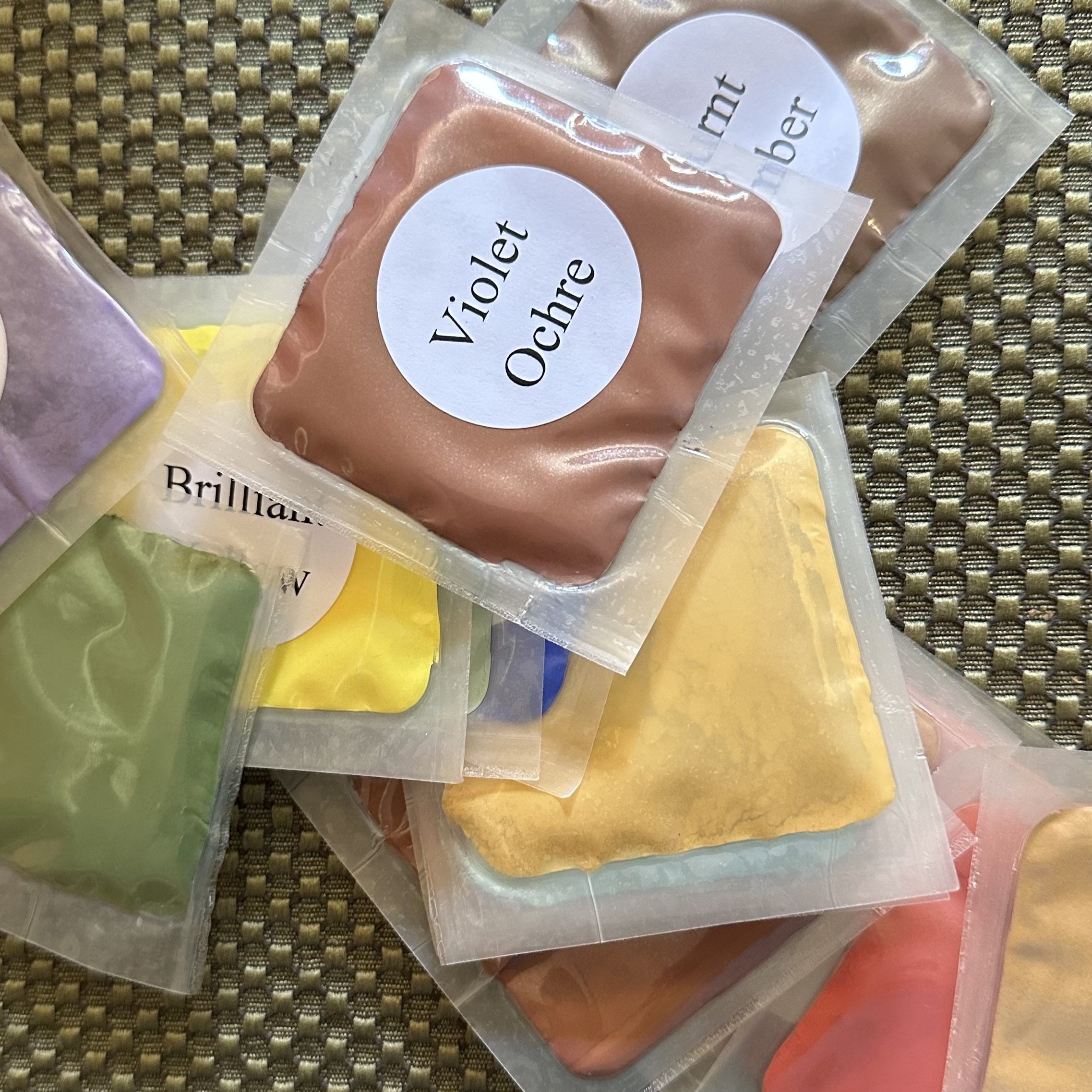 Photo of powdered pigments in various colors